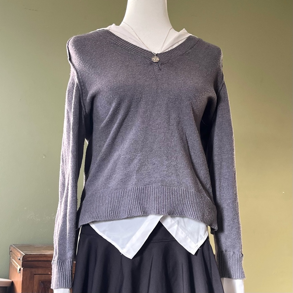 Gray V-Neck Sweater with Layered White Shirt